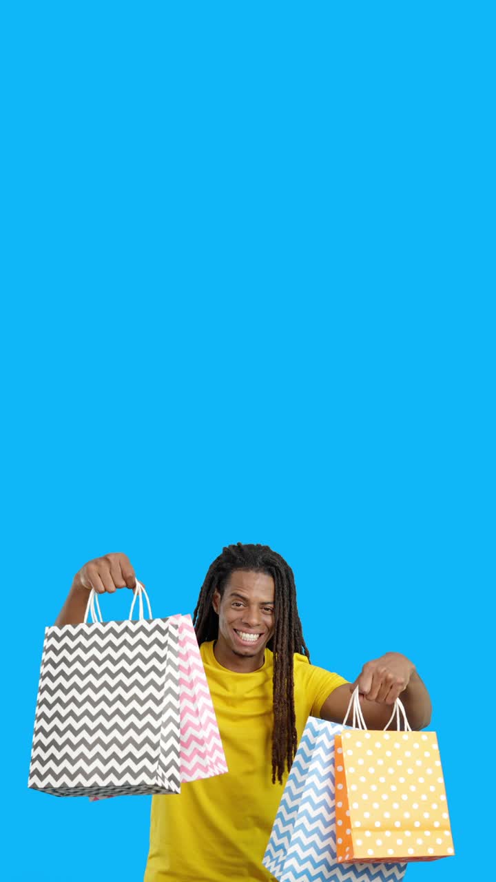 Man holding shopping bags
