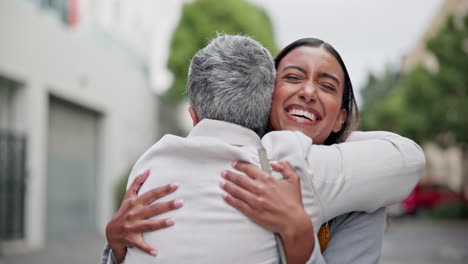 Love,-hug-and-mother-hug-daughter-in-a-city