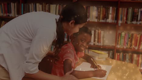 Animation-of-light-spots-over-caucasian-female-teacher-helping-african-american-schoolboy