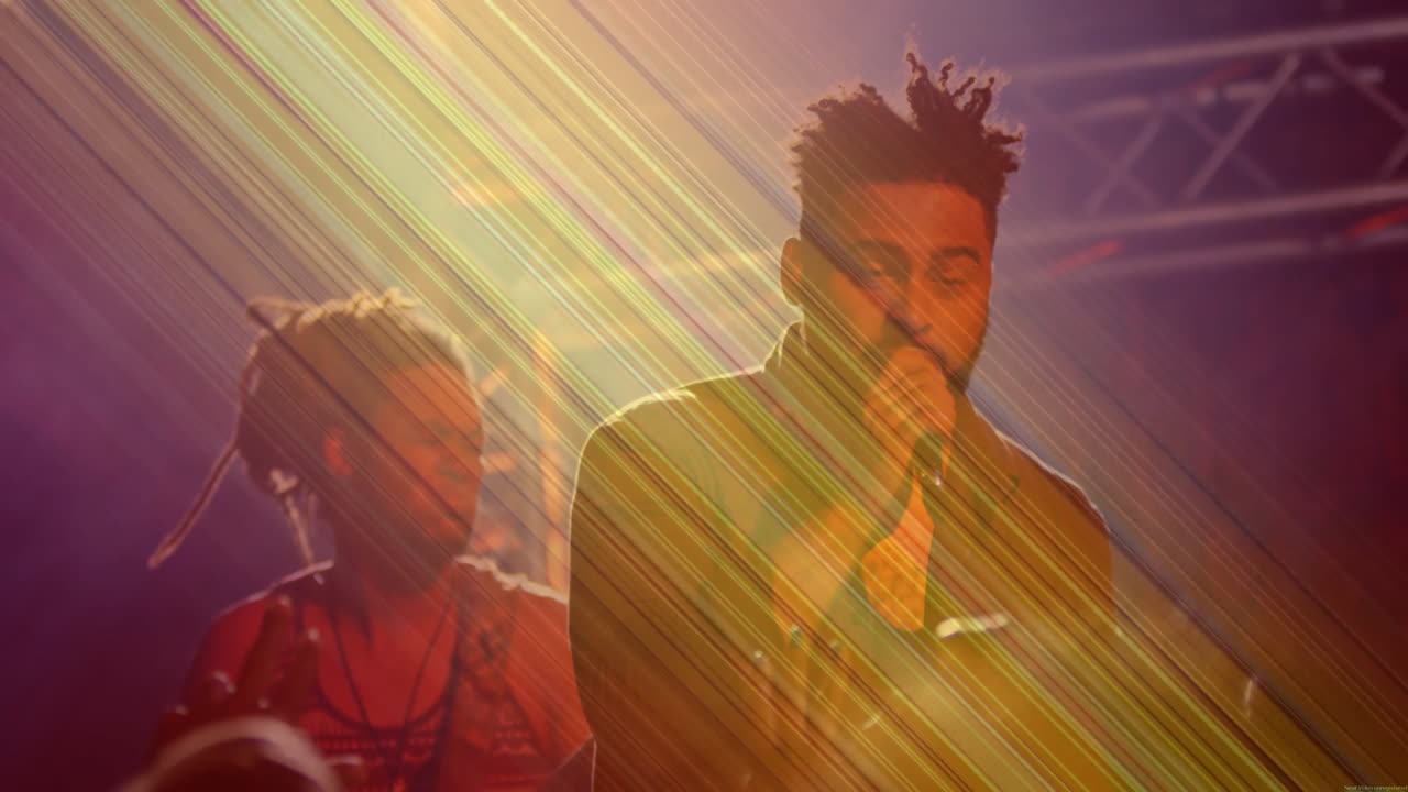 bandmates performing on concert stage, holding microphone playing guitar with animated light beams