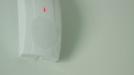 the motion sensor alarm is triggered. the red led on the sensor lights up