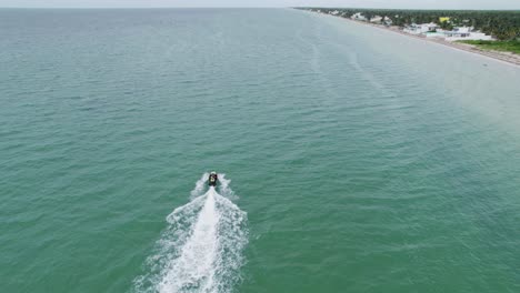 aerial view jet ski near the beach