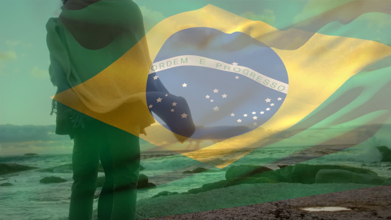 Animation af Brasiliens flag over afroamerikansk par på strand