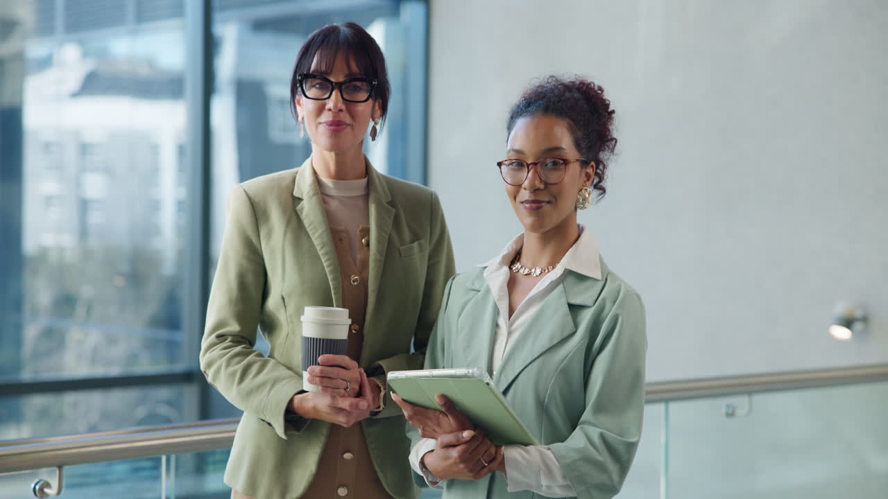 Two Businesswomen in Office Setting