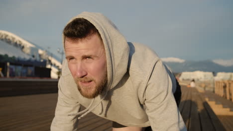 man doing push-ups outdoors