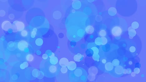 partículas azules voladoras y bokeh redondo