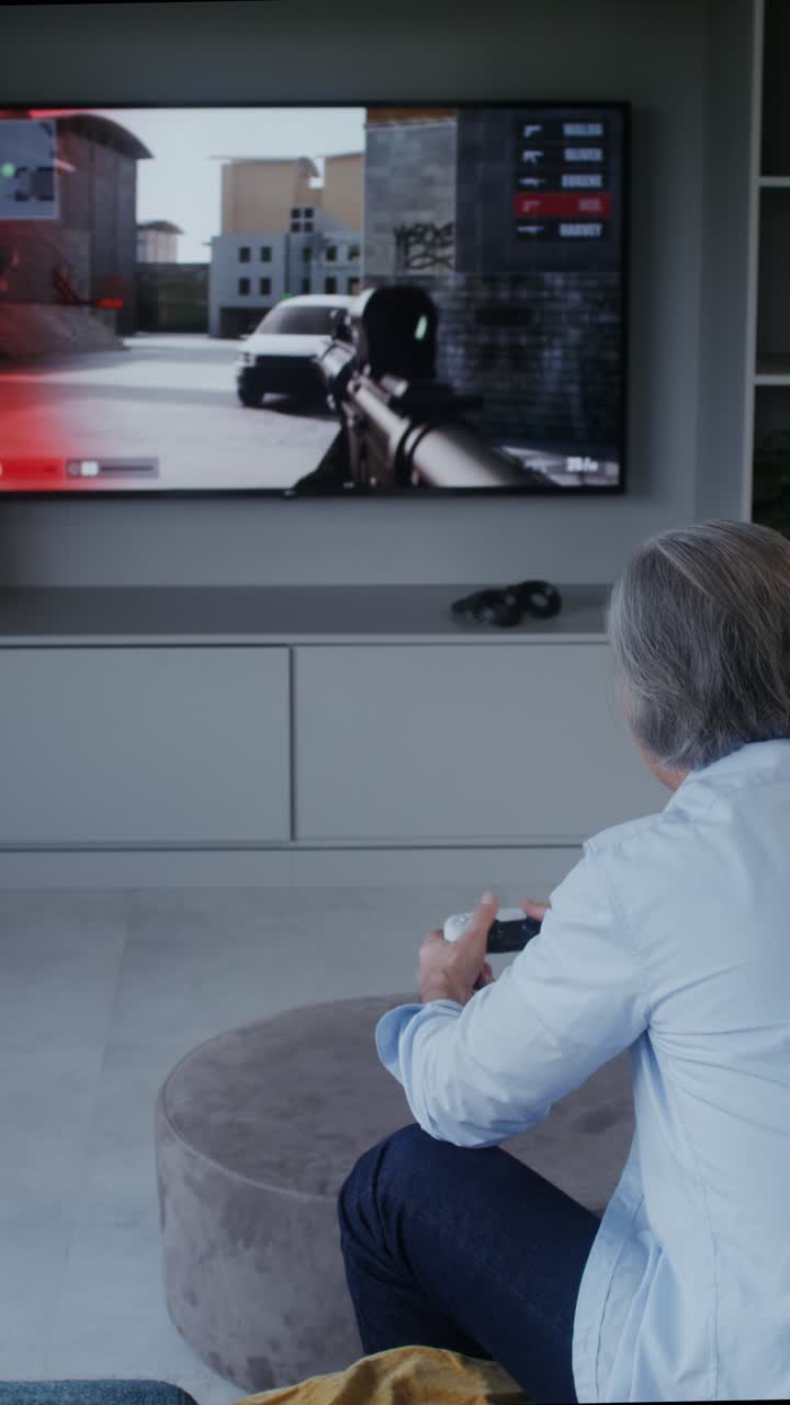 Woman playing console video game on TV