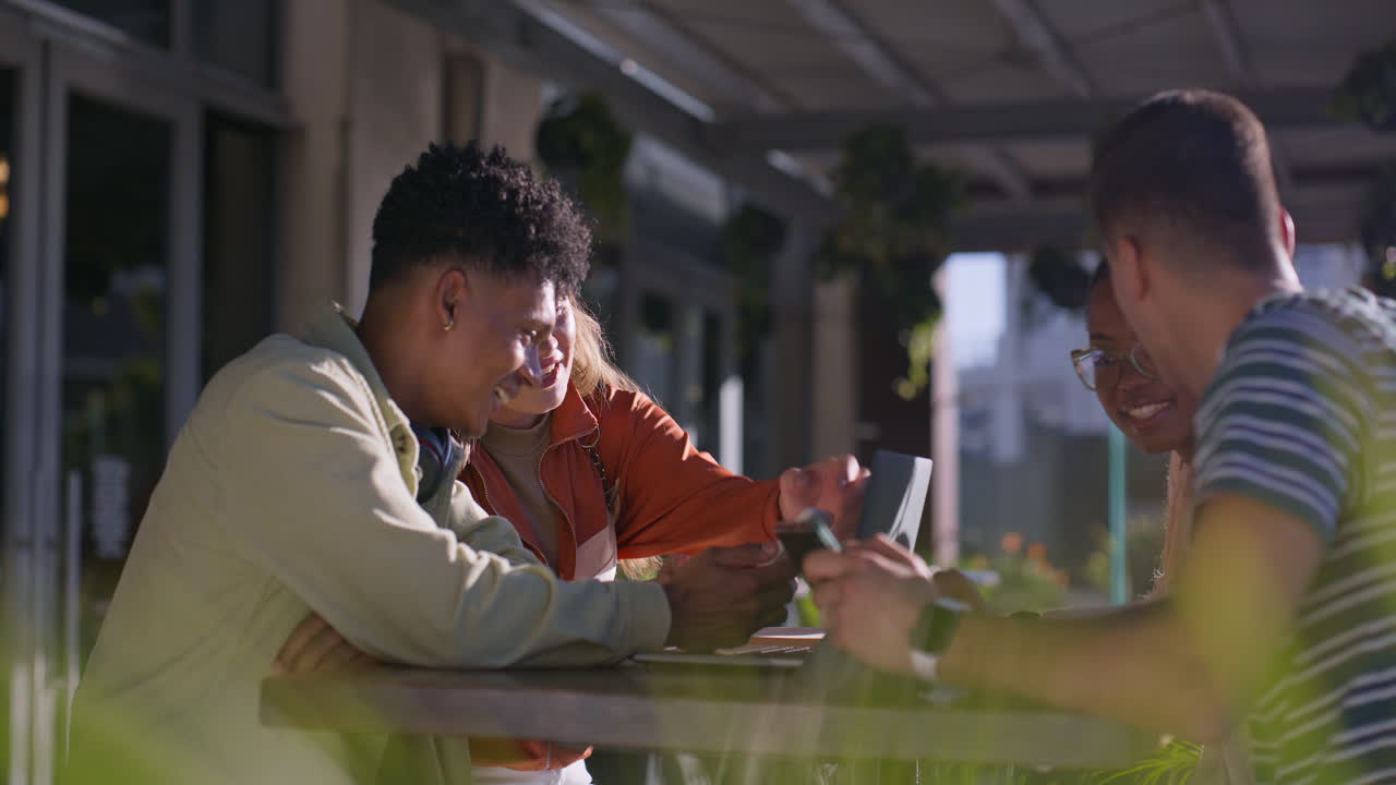 Friends Socializing at Outdoor Cafe