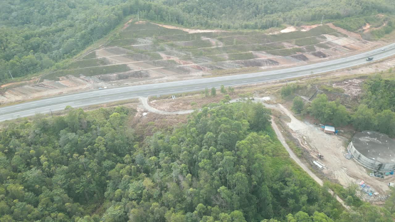 Beautiful Drone View Of Bau To Lundu Pan Borneo Highway During Morning Sunset With Mountain And Valley, Green Forest,Sarawak, Borneo.