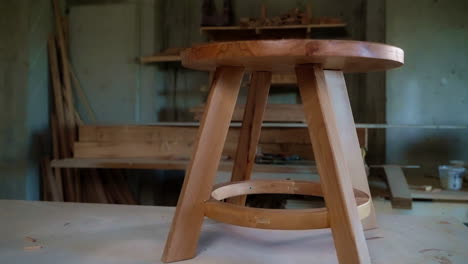 handmade wooden stool in a workshop