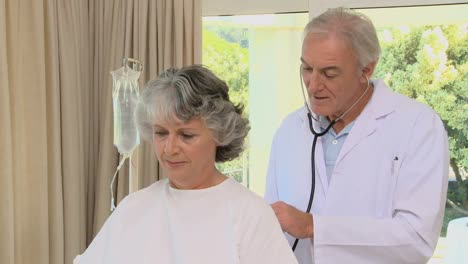 doctor talking with a patient during a walk