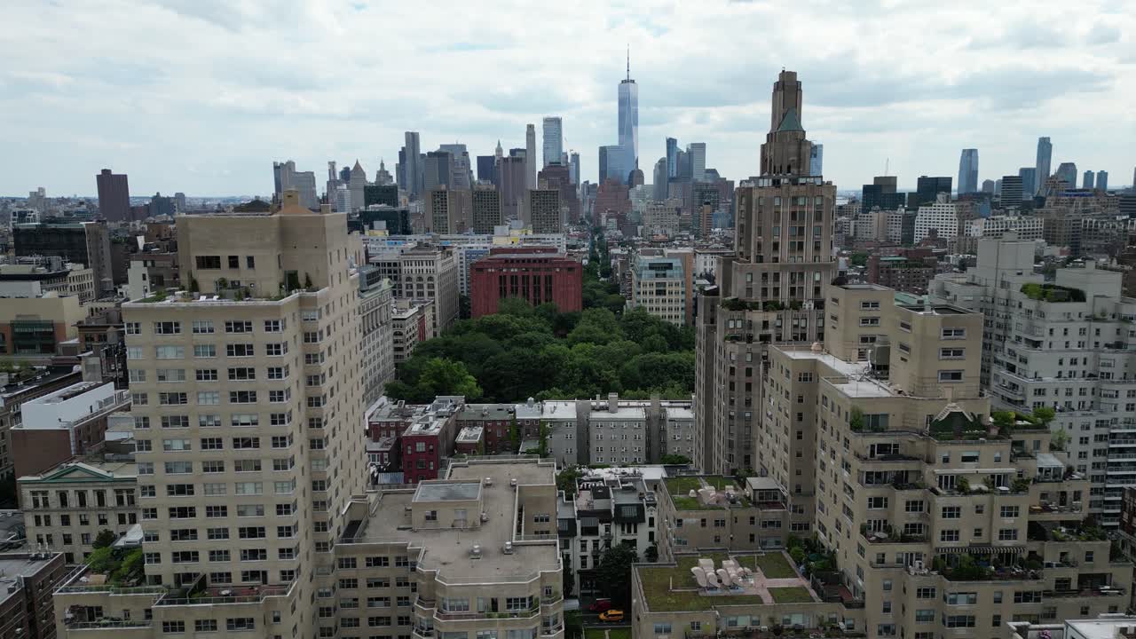 Drone push-in shot of E 12th Street, New York in horizontal orientation. Captures the urban landscape and street activity, perfect for real estate, travel, or cityscape projects.