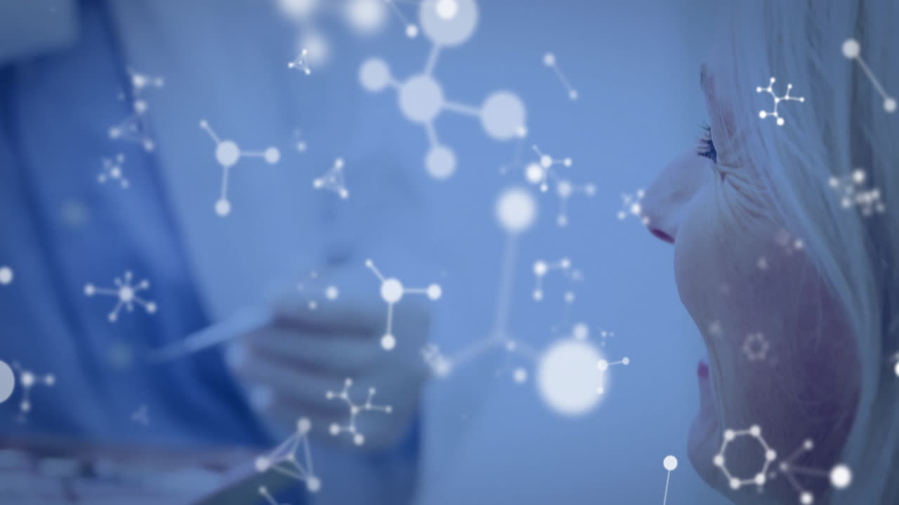 Animation of molecules over caucasian male dentist and senior female patient