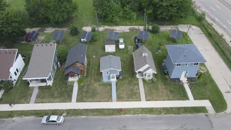 aerial sideways shot from the tiny home project, cass community for people in need, next to a highway, detroit, michigan