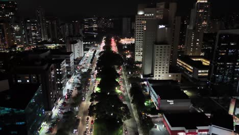 nighttime cityscape with traffic and buildings