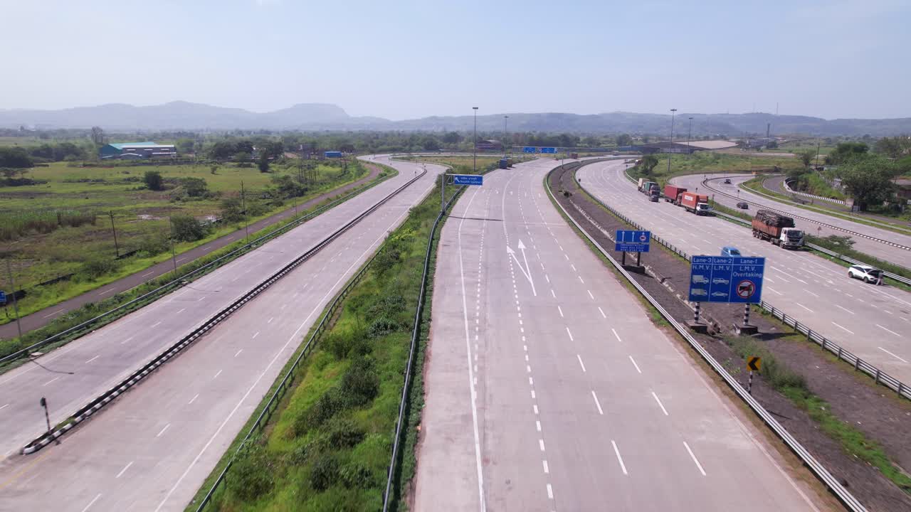 Nashik Igatpuri route on Mumbai Nagpur Expressway through western ghats landscape, Maharashtra, revealing drone shot