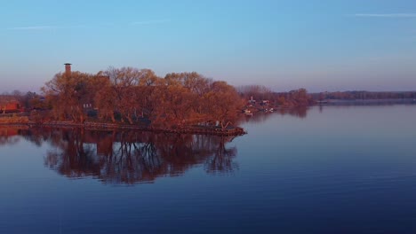 aerial peaceful sunrise over a lake