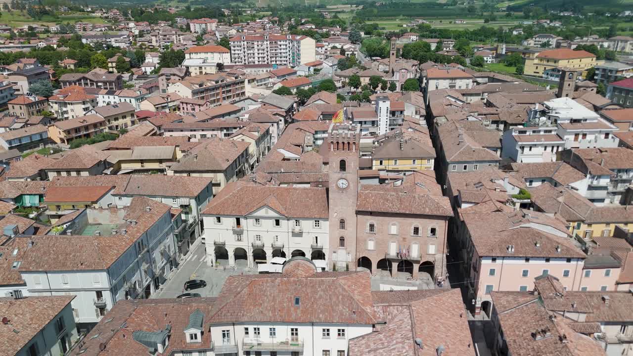 Nizza Monferrato, UNESCO site, Asti, Piedmont, Italy. 4k aerial view of the city hall and central square. Langhe-Roero and Monferrato. Circling to the left above the city.
