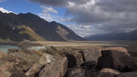 mount cook and tasman glacier lake on a cloudy day in new zealand - wide shot