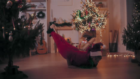 excited man dancing on floor at home during christmas