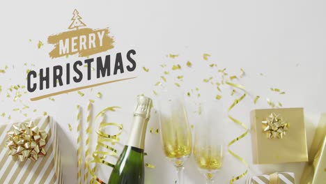 Animation-of-christmas-greetings-text-over-christmas-presents-and-champagne-glasses-and-bottle