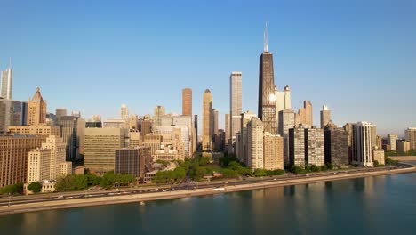 Morning-Sunbeams-Shinning-On-Chicago-Highrises-and-Lake-Michigan-Drone