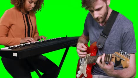 Musicians-playing-piano-and-guitar