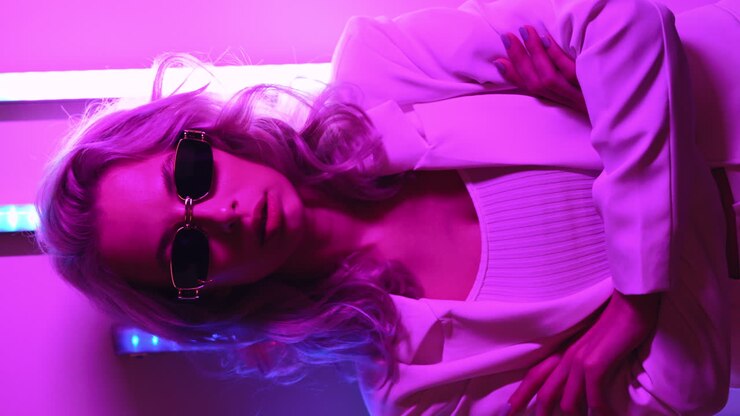 Stylish Woman in Neon Light