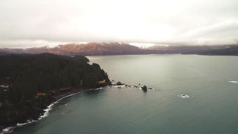 Aerial-footage,-Kodiak-Alaska,-Fall-on-the-coastline