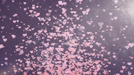 animation of light spots and hearts on blue background