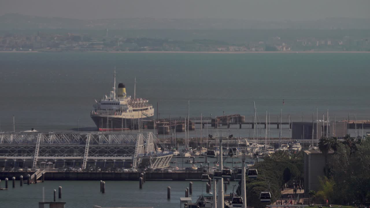 An aerial view of a ship near the Lisbon port quay