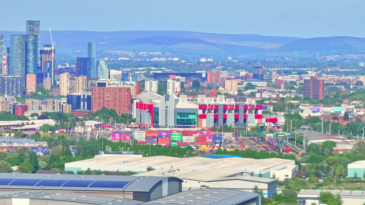 Crane up drone shot of the back of Old Trafford Greater Manchester, England