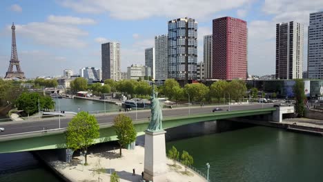 a reverse aerial recording of the statue of liberty in paris