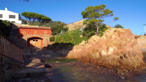 european beach in mediterranean spain white houses calm sea turquoise blue begur costa brava ibiza