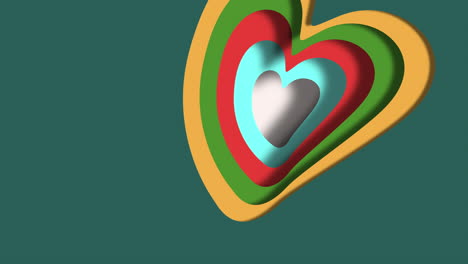 vibrant striped heart floating on green background