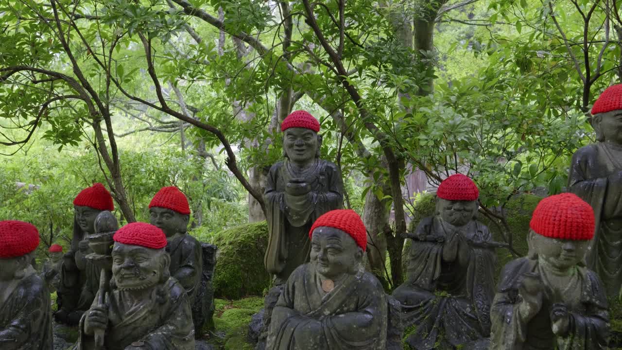 Traditional Japanese Jizo Statues, slow slider shot