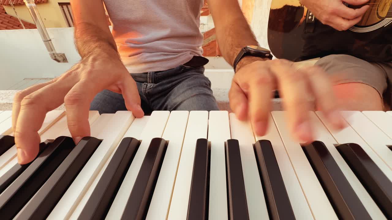 Musician playing piano and guitar
