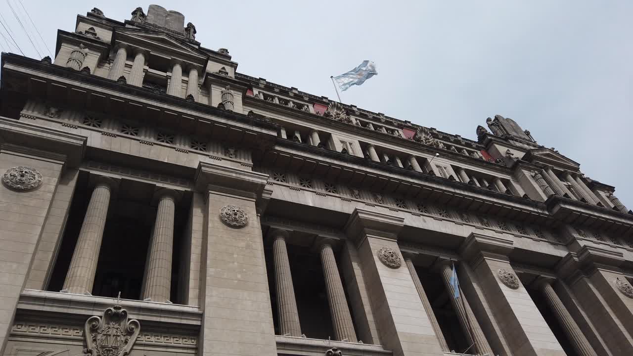 Low angle view Palace of Justice building of Argentina, national flag skyline