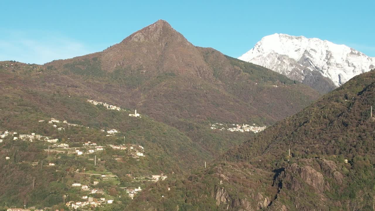 Stunning aerial view of the Alps mountains in Italy with clear skies