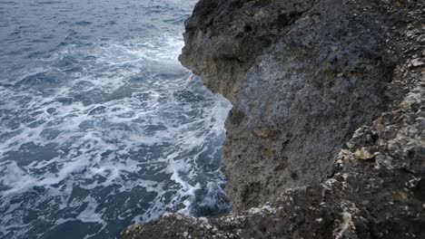 bouldered islands rocks wet from wild waves at mediterranean ibiza malta