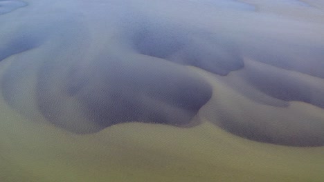 large olfusa river had silted up and make beautiful pattern in south iceland