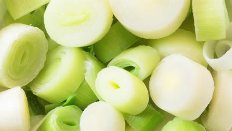 Fresh-chopped-leek-in-a-ceramic-bowl-isolated