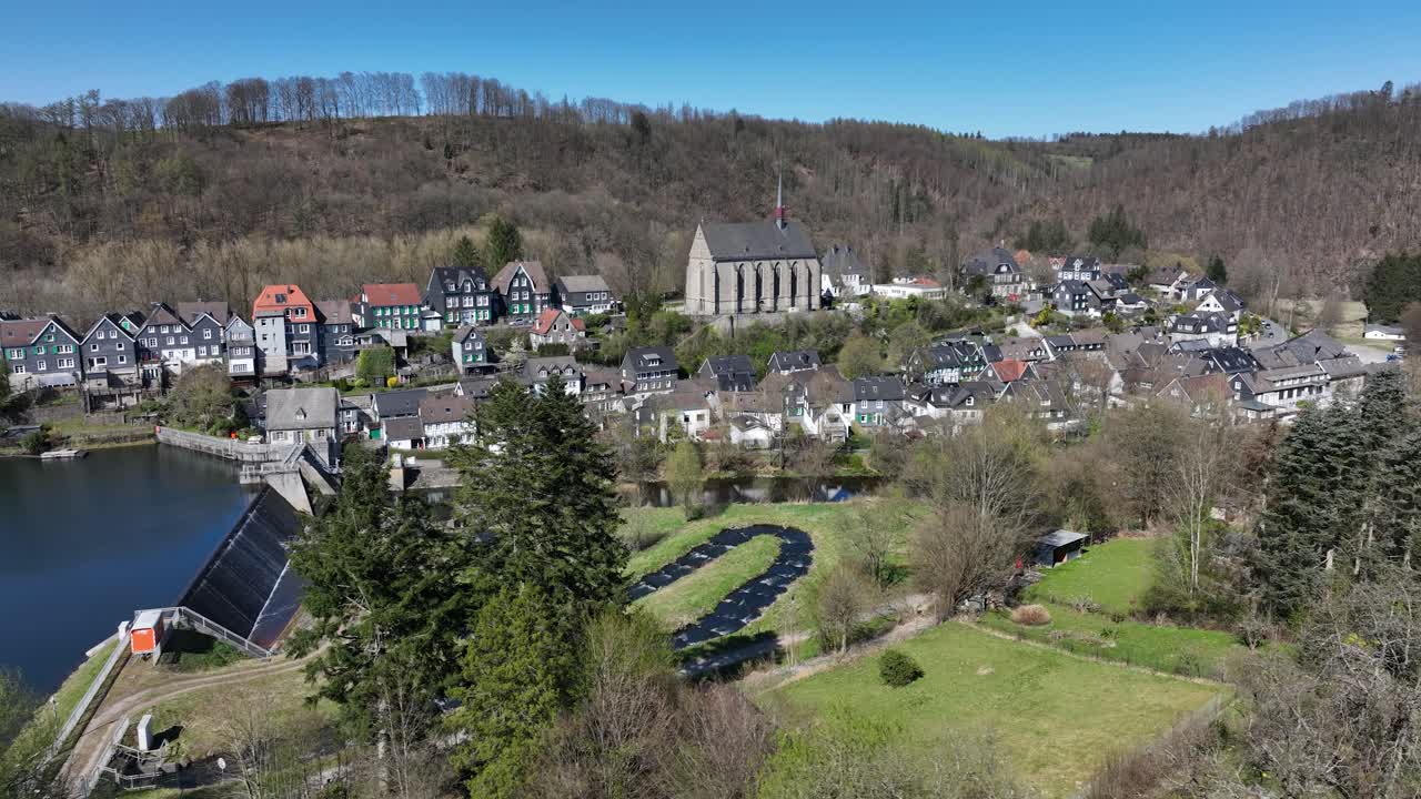 The Wupper forms a reservoir, picturesquely located at the foot of the old town of Beyenburg, Beyenburger Stausee. Aerial view.