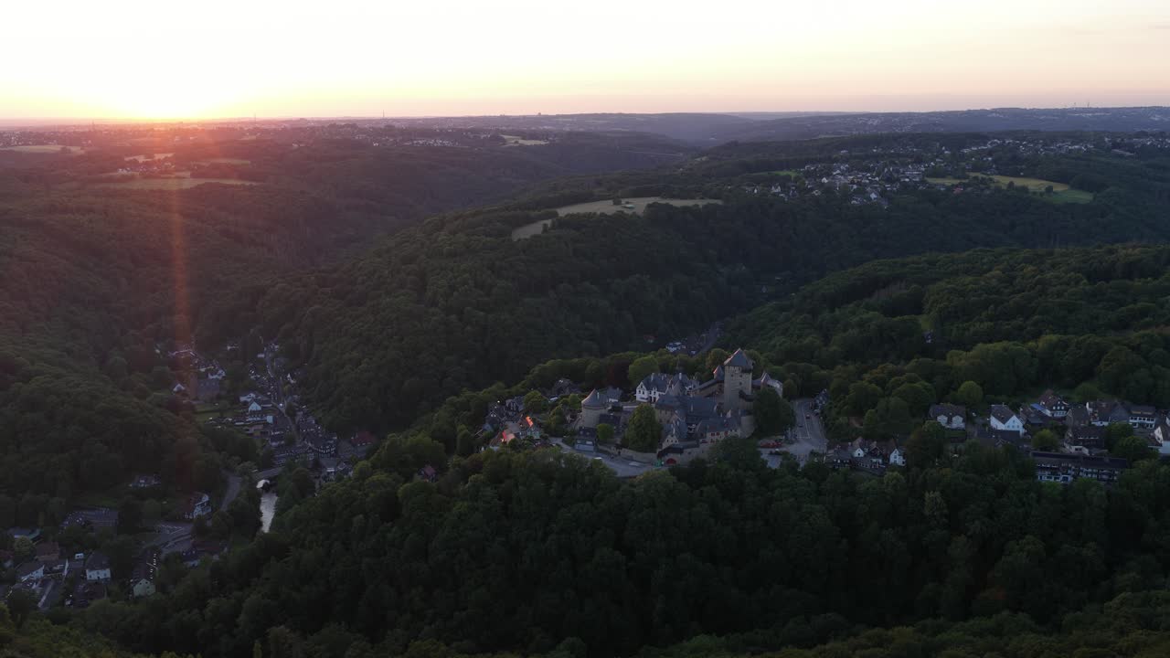 Slot burg, castle in Burg an der Wupper , a borough of the German city of Solingen. Aerial drone video at sunset.