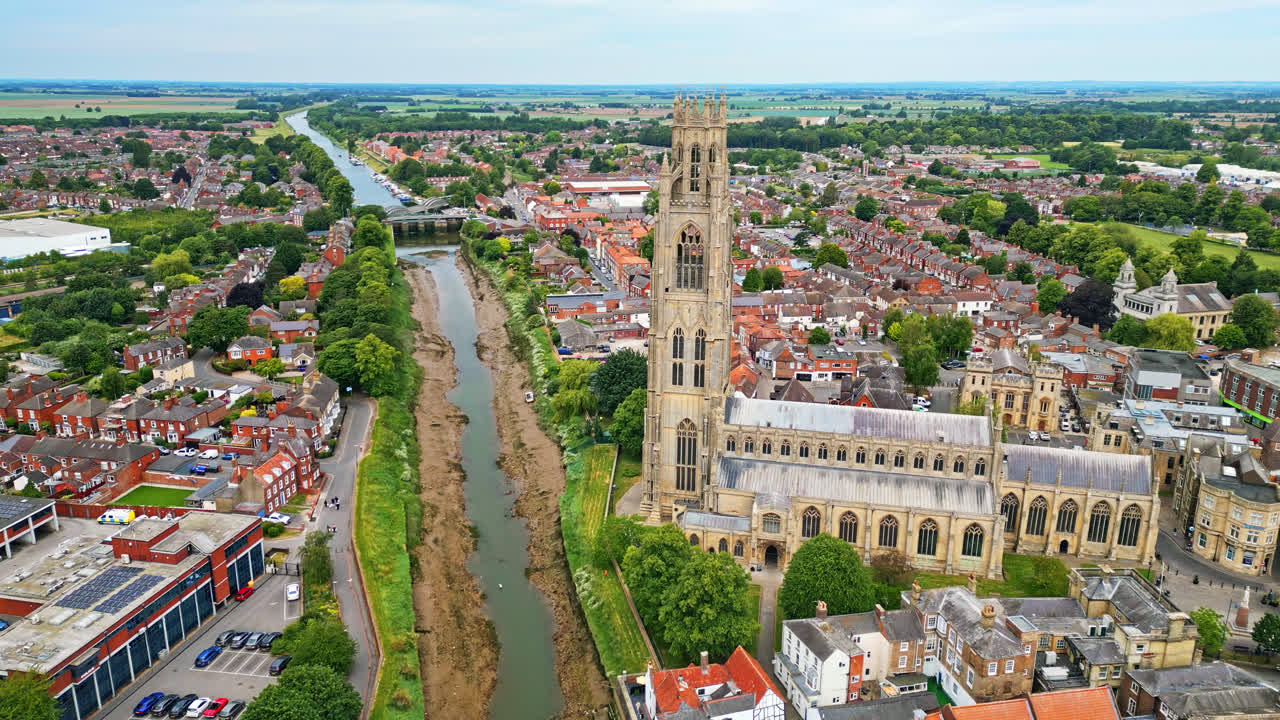 scenic beauty of Boston, Lincolnshire, in mesmerizing aerial drone footage: Port, ships, Saint Botolph Church , Saint Botolph's Bridge