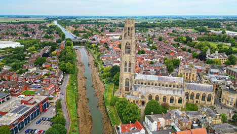 scenic-beauty-of-Boston,-Lincolnshire,-in-mesmerizing-aerial-drone-footage:-Port,-ships,-Saint-Botolph-Church-,-Saint-Botolph's-Bridge