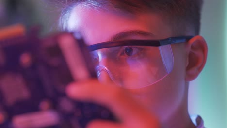 close-up eyes of boy with high tech interest.