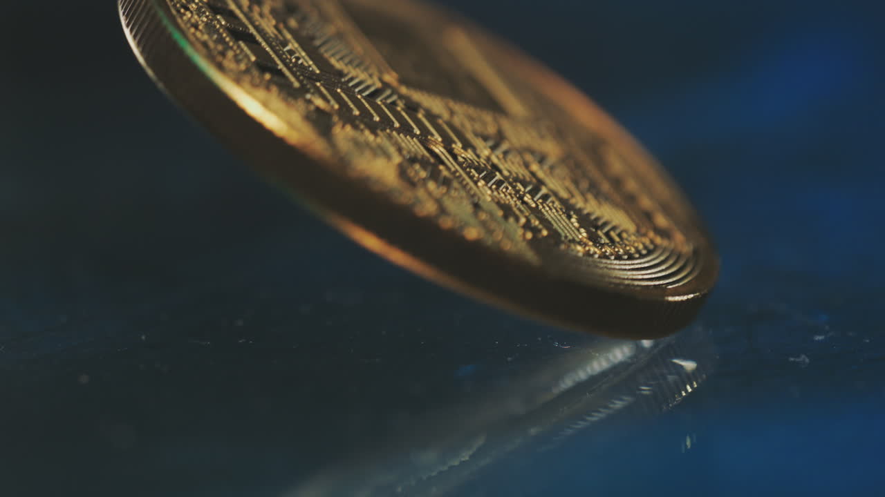 moneda de oro giratoria