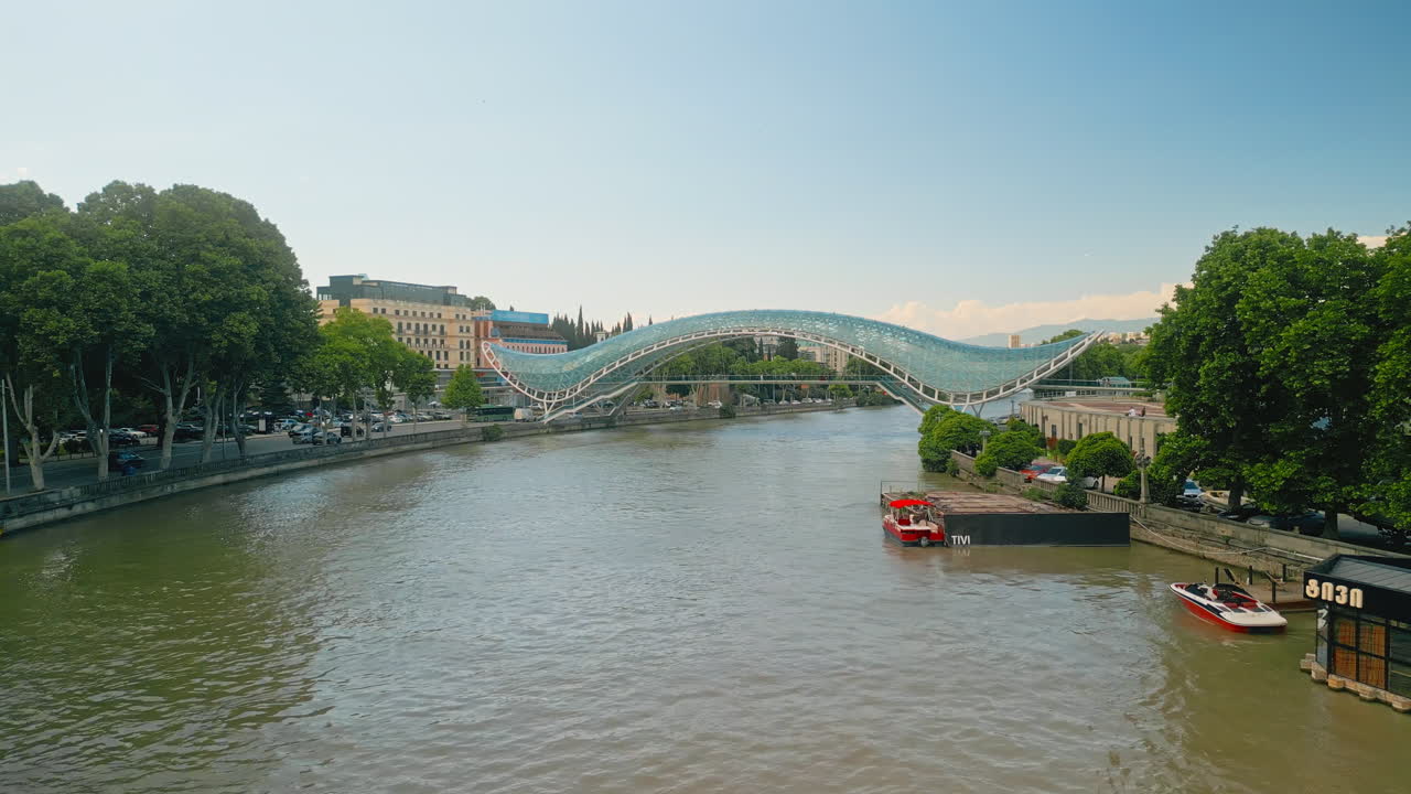 Panoramic view of the Bridge of Peace over the Mtkvari River in Tbilisi, Georgia