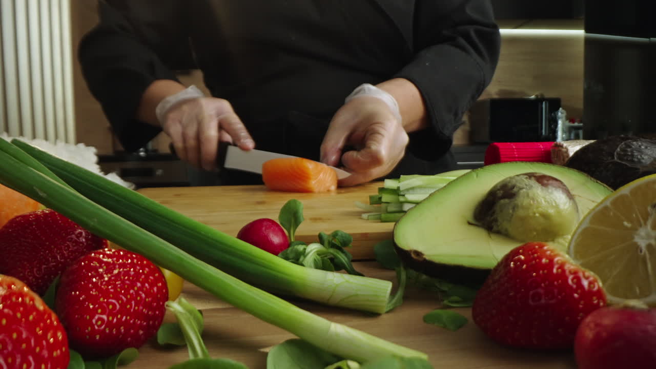 Chef preparing fresh sushi ingredients